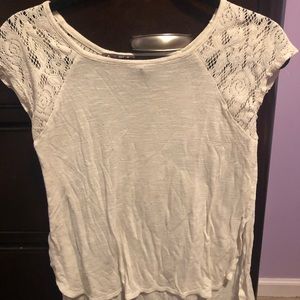 cream colored short sleeve tee shirt